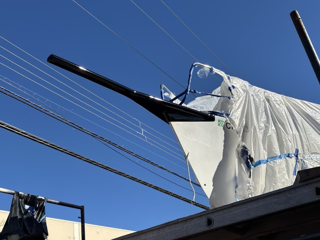 Custom bowsprit on the bow of a sailboat