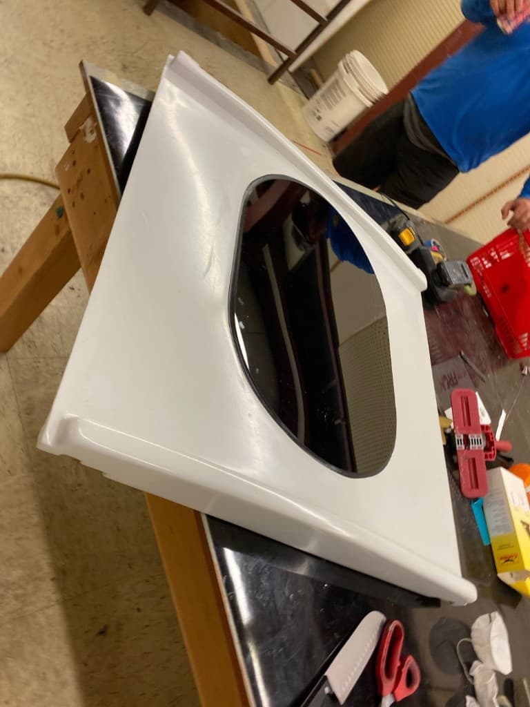 Custom molded panel with oval glazing on the shop bench